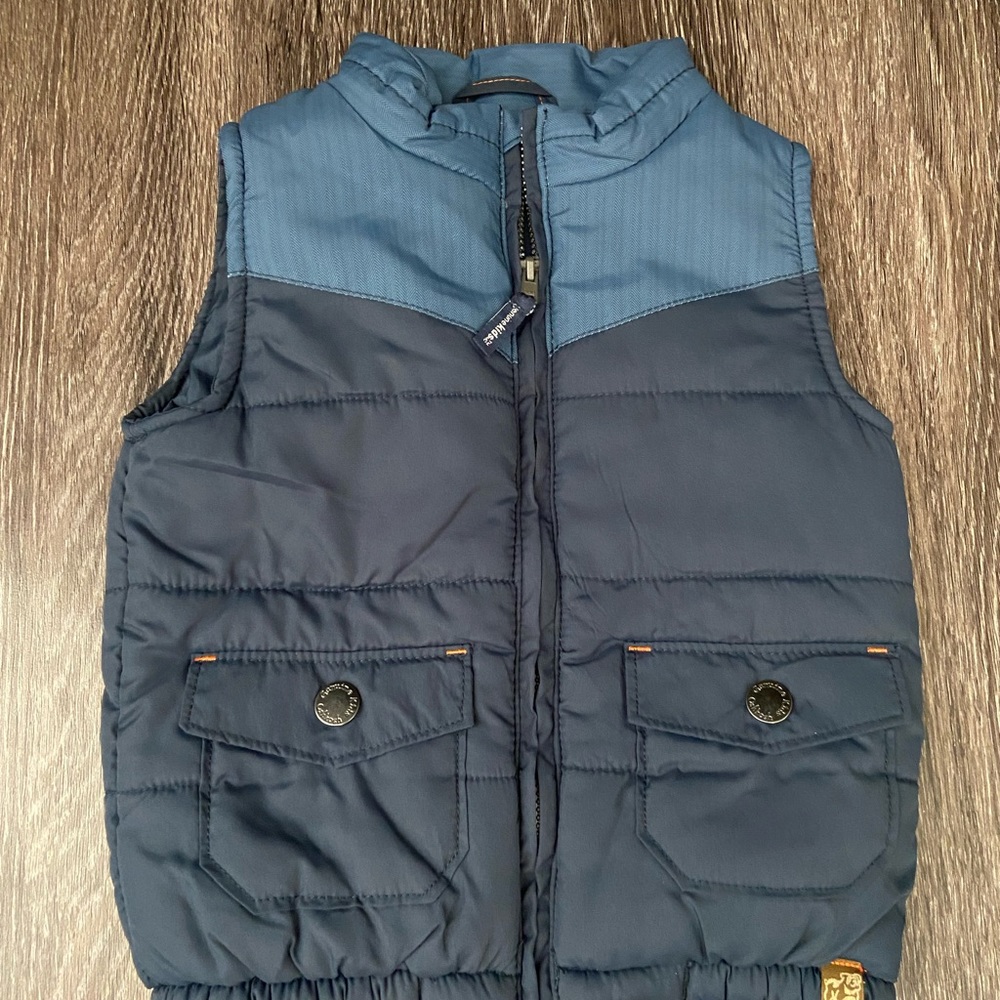 Blue vest size 24 months in perfect condition.